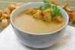 Chanterelle soup puree served with croutons
