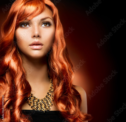 Photo: Portrait of a Beautiful Girl With Healthy Long Red Hair Portrait of a Beautiful Girl With Healthy Long Red Hair