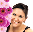 Portrait of a young brunette woman with flowers