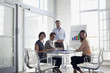 Photo: Portrait of confident business people meeting in conference room Portrait of confident business people meeting in conference room