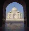 View of Taj Mahal facade through archway