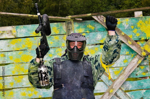 Photo: Paintball players in full gear at the shooting range Paintball players in full gear at the shooting range