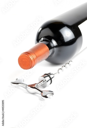 Photo: Wine bottle and corkscrew Wine bottle and corkscrew