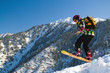 Sport man in snowy mountains