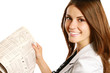 Photo: Portrait of a young business woman reading paper Portrait of a young business woman reading paper