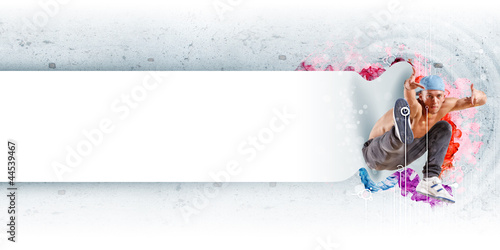 Photo: young man dancing hip hop with color lines young man dancing hip hop with color lines