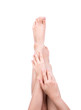 Beautiful woman crossed legs and hands isolated over white backg