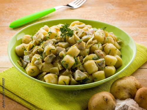 Photo: homemade gnocchi with artichoke,vegetarian food homemade gnocchi with artichoke,vegetarian food