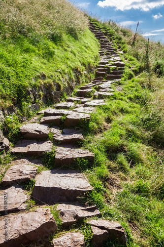 Photo: Stone path in the mountains leading to the peak Stone path in the mountains leading to the peak