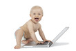 Photo: Smiling baby and laptop isolated on white Smiling baby and laptop isolated on white