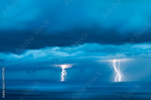 Photo: Storm over the sea with lightning Storm over the sea with lightning