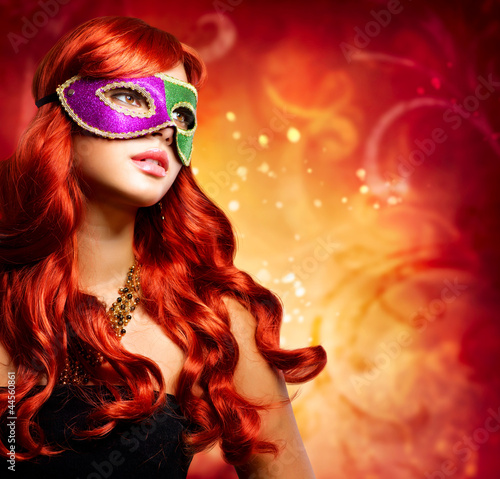 Photo: Beautiful Girl in a Carnival mask Beautiful Girl in a Carnival mask