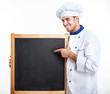 Chef holding an empty blackboard