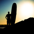 Photo: Long boarder watching the waves Long boarder watching the waves