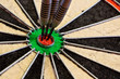 three Darts in bullseye