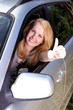 Happy girl in car