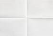 White sheet of paper folded in four