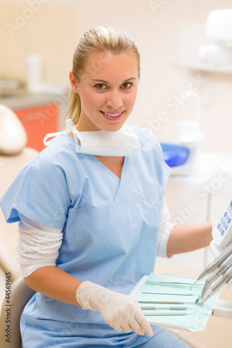 Foto: Professional dental staff with medical tools Professional dental staff with medical tools