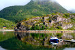 Lofoten, mirror lake with boat