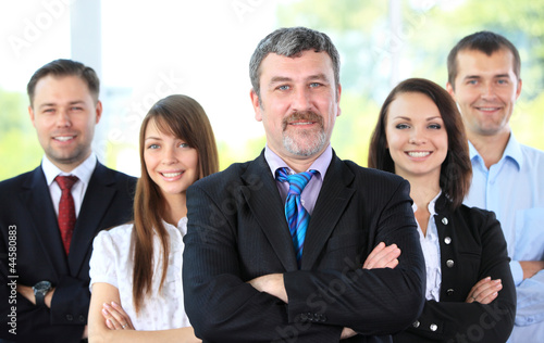 Photo: Group portrait of a professional business team Group portrait of a professional business team