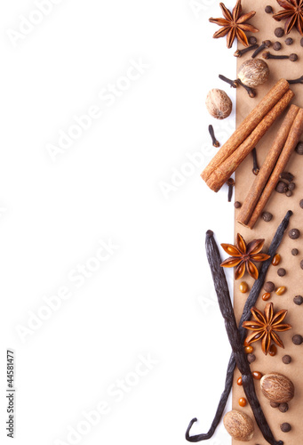 Photo: background with spices and herbs over white background with spices and herbs over white