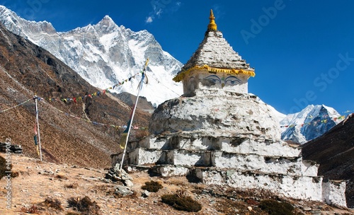 Photo: buddhist stupa with mount Lhotse - way to everest base camp buddhist stupa with mount Lhotse - way to everest base camp