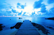 Wooden pier at the beach in the morning light