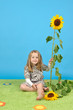 Mädchen mit Sonnenblumen