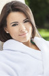 Beautiful Hispanic Woman in White Bathrobe At Health Spa