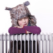 Cute girl with pelt cap likes the winter