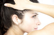Beautiful young woman portrait profile serious white