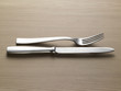 fork knife on wooden table - forchetta coltello su legno