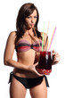 Photo: sexy woman in bikini holding a cocktail with tropical fruits in sexy woman in bikini holding a cocktail with tropical fruits in
