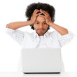 Worried man on a laptop