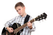 Foto: The boy with an acoustic guitar The boy with an acoustic guitar