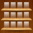 wooden shelves with empty glass boxes
