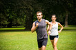 Running together - young couple jogging