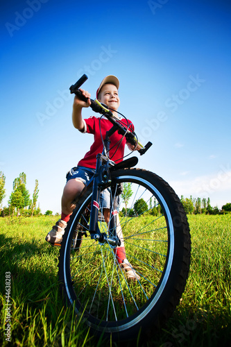 Photo: Six year old boy on a bike Six year old boy on a bike