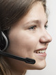 Portrait of a confident young female customer service agent with