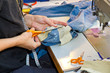 Foto: Schneiderin bei der Arbeit Schneiderin bei der Arbeit