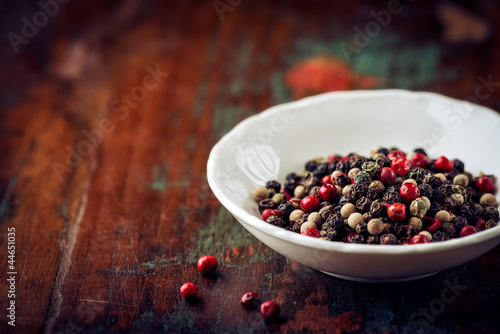 Photo: Different peppercorns in a bowl Different peppercorns in a bowl