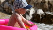 Video: The child plays on the seashore. The child plays on the seashore.