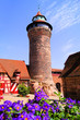 Medieval tower of Nuremberg Castle with flowers