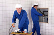 Plumbers at work