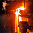 Pouring of liquid metal in open hearth workshop