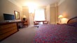 Bedroom with lamps on each side of bed