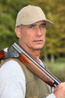 Hunter with rifle on shoulder