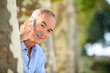 Senior man with telephone