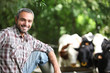 Farmer with cows
