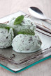 Foto: Three scoops of ice-cream on a plate. Three scoops of ice-cream on a plate.